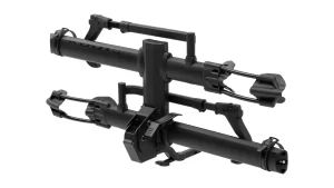 The NV Base 2-bike hitch rack is designed to be a basic version of the NV 2.0, but obviously, there's nothing basic about it. For starters, it's available in both 1.25-inch and 2-inch hitch receiver sizes, ensuring compatibility with a wide range of vehicles. It accommodates a wide variety of bike wheelbases and tire widths, too. It's e-bike compatible, holding e-bikes that weigh up to 60 pounds per tray. Don't worry about lifting that bad boy; we've got you and your bike with our e-bike ramp that attaches to the bike rack tray. Like the NV 2.0, the Base 2.0 2-bike rack has adjustable front tire cradles that help minimize seat post and handlebar interference, and a handy pivot lever that tilts an extra 45 degrees for additional clearance inside your vehicle's back hatch or trunk. Our thoughtfully designed hand-tight hitch cam system keeps the rack rocking, be it wobble-free, on all your biking adventures. The provided hitch lock adds a level of security at the hitch, while the integrated cable lock helps keep your bike secure. When you’re ready to roll again, the integrated cable locks retract right back into the rack. Increasing your circle of friends means it's time to increase your carrying capacity to 2-bikes, 3-bikes, or 4-bikes. Easily install these Add-Ons in less time than it takes your friends to decide who sits up front. All these features, plus our No Worries Limited Warranty and face-melting Customer Service, means we've got your rack and your back.