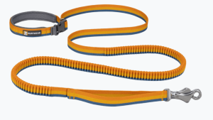 The Roamer™ is an adjustable stretch-webbing running dog leash that can be hand-held or worn around the waist for a dynamic hands-free leash experience.