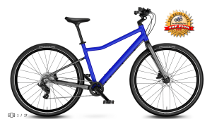 The Woom Explore 6 is a superlight, all-rounder 26" children's bike for riders aged 10 and up with disc brakes, 8 gears and all-terrain tires. See all the colors today at Lititz Bikeworks The Woom Explore 6 Blue is ideal for ages 10 and up with height ranging from 55-65". With a weight of just 20 pounds, the Woom Explore 6 is the ideal way to level-up your childs pedaling abilities. Some of the top features include: Child-specific geometry, disc brakes, all-terrain tires, 8 gears, ergonomic saddle, ergonomic grips, quick-release seatpost clamp, adjustable stem