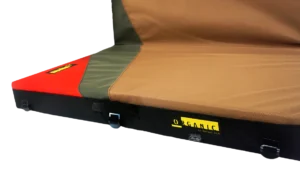 Our most popular and quickest shipping pad! A streamlined version of the Full Pad, the Simple Pad (36"x48"x4") is the same pad without the sewn on pocket flap. The go-to option for boulderers looking for the highest quality foam and fabrics without any added bells or whistles. This elegant pad closes securely via 4 simple metal buckle closures along the outside of the pad (3 along the 36” height and 1 on the bottom). The Simple Pad features a 1050d ballistics shell, 1000d pad top, 3 convenient grab handles, hybrid hinge, beefy adjustable shoulder straps, sternum stabilizer, beefy 2" hip belt and is compatible with our deluxe hip belt for added support. Add our innovative Load Flap for easily and securely piggybacking multiple pads to your simple pad.