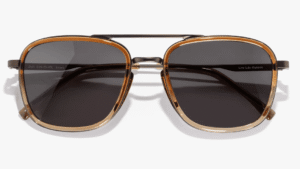 Estero is a large, square aviator built on our premium multi-material architecture. Strong proportions, a double bridge, and sculpted nosepads deliver standout style with trademark Sunski all-day comfort. Subtle aviation cues—lens-perimeter filigree and wing-inspired temples—nod to its heritage. Large square lenses provide confident coverage and unmistakable presence. Crafted from palladium-coated, electroplated SAE 304 stainless steel for serious durability and premium Aura lenses for unmatched optics.
