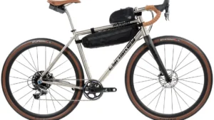 There's a great many half/ partial framebags on the market, though many limit the ability to run multiple water bottles or other bags because of fixed mounting points and excessive depth. Fully customizable mounting points around the entire outside of the bag allows for numerous fits and for additional gear to be stowed below the bag. This is the perfect bag for long single day rides or warm weather multi-day endeavors.