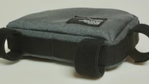 A clean, simple and durable stem bag for your everyday cycling pursuits! Features daisy chain around bottom and front for easy customization between bikes. Quickly and securely attaches to your bike with 1” hook and loop velcro, ships with 3 straps standard. Closes with #8 Waterproof Zipper. Built with Colorful and fun 1000D Cordura Nylon. Available in Colorful Cordura or Wateproof X Pac Freshly updated with stiffened "anti-sag" sides.